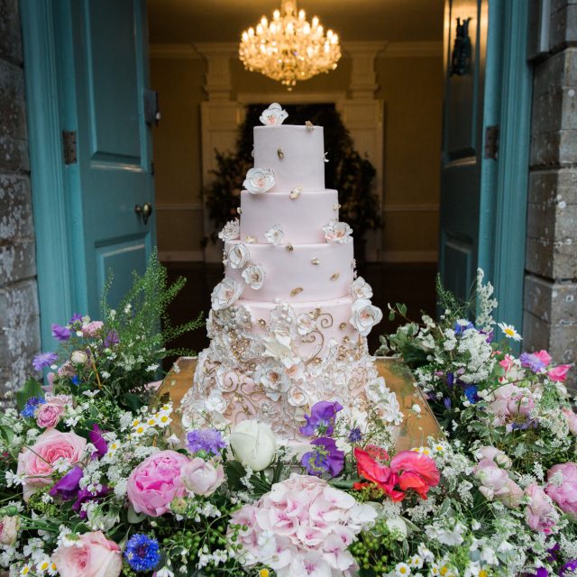 Wedding cake at a wedding at the Kingstone Estate in Devon. Alice and Tarquin planned their wedding with Jenny Wren, Wedding planner in Devon and Cornwall