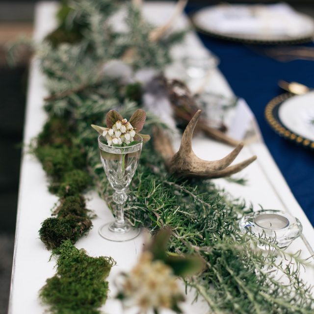 Ideas for floral table decorations if you're planning a wedding in Cornwall. This picture was taken during a wedding planned by Jenny Wren, Wedding Planner in Cornwall.