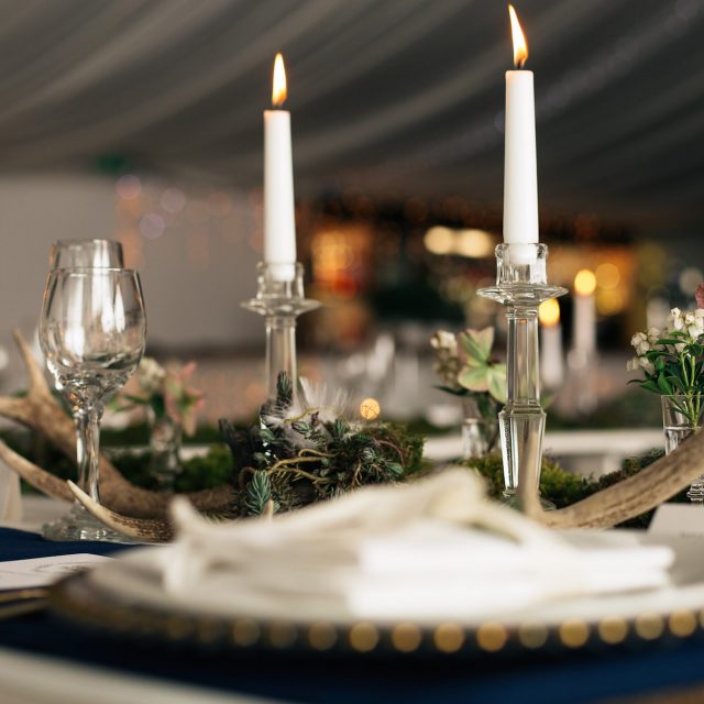 Place setting at a wedding in Cornwall complete with candles. This picture was taken during a wedding planned by Jenny Wren, Wedding Planner in Cornwall.