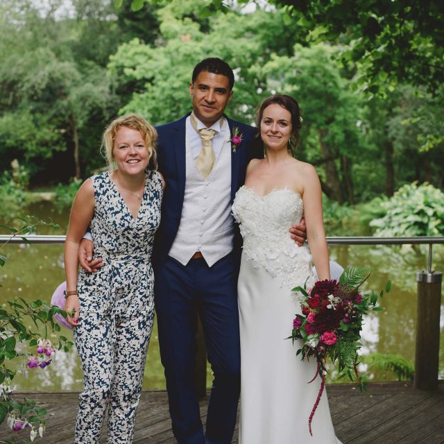 Jenny with the bride and groom at a private home wedding in Cornwall