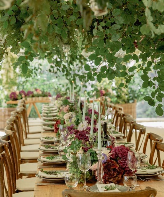 Close up shot of one of the long tables at a wedding breakfast. This wedding in Cornwall was planned by Jenny Wren - wedding planner.