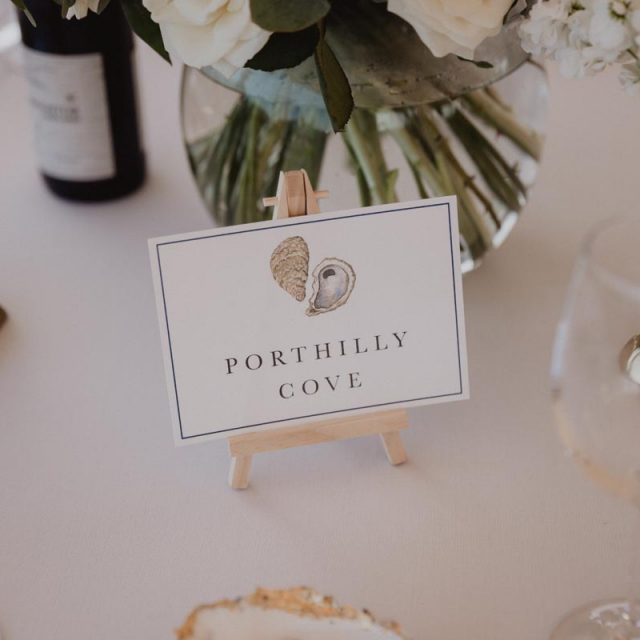 Close up of the table place name called 'Porthill Cove'. This wedding in Cornwall was planned by Jenny Wren - wedding planner.